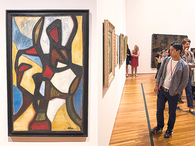 La Kahena by French-Algerian artist Jean-Michel Atlan is based on a queen of the North African Berber people (left). Visitors taking in the artwork displayed (right).