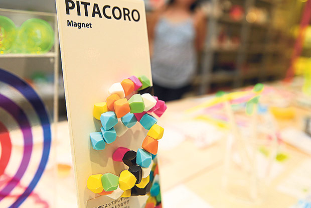 A handy little plastic bag container for pet owners.