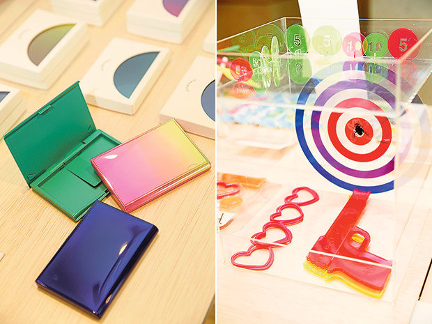 Ornament card cases are made from a material that was originally meant for phone cases (left). Hit the bull’s eye with the fun Love & Peace Gun loaded with heart-shaped rubber bands (right).