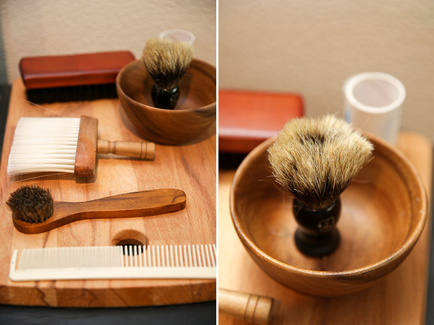 Tools of the trade (from rear to front): clipper brush, shaving brush and bowl, neck brush, fade brush, and comb (left). Shaving brush made from badger hair (right).