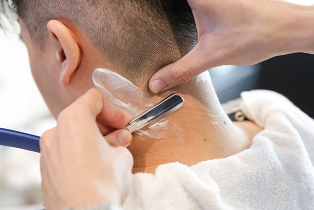 Straight razor work on the back of the neck.