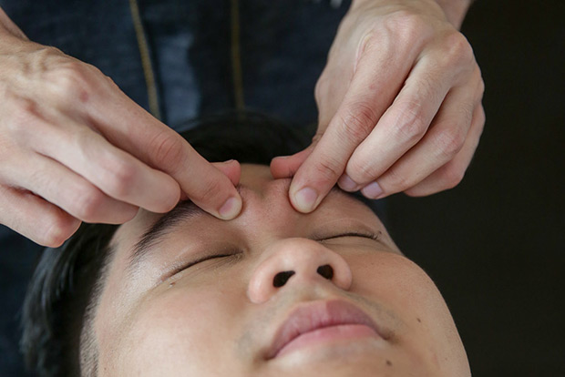 A facial massage after the haircut.