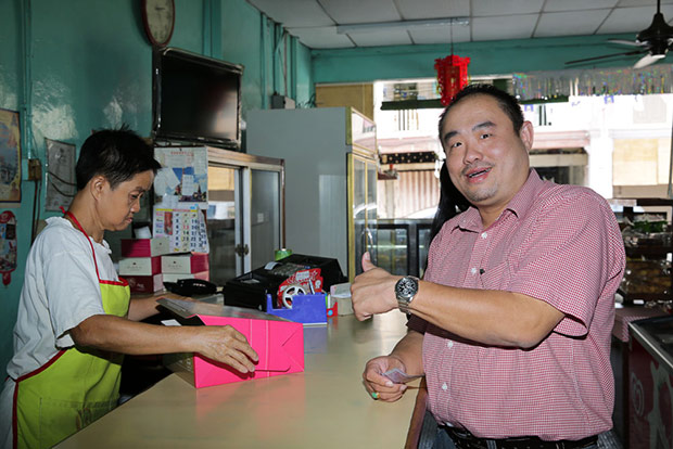 Loyal customer Elton Tan has been eating the pandan layer cake since he was 8 years old.