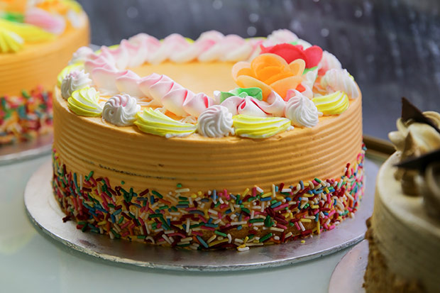 The counter also has pre-made sponge cakes that are decorated for any occasion.