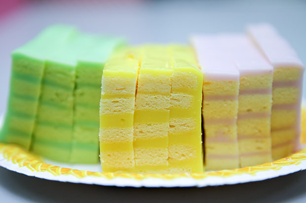 Pastel beauties in a row: pandan layer cake, corn layer cake and yam layer cake.