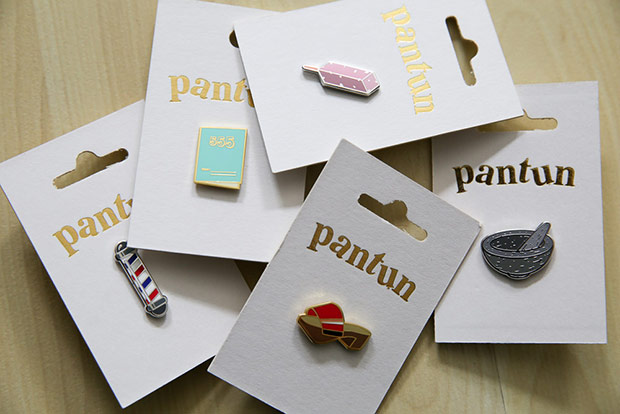 The pins use a lot of Malaysian culture references like clogs or even the traditional mortar and pestle.
