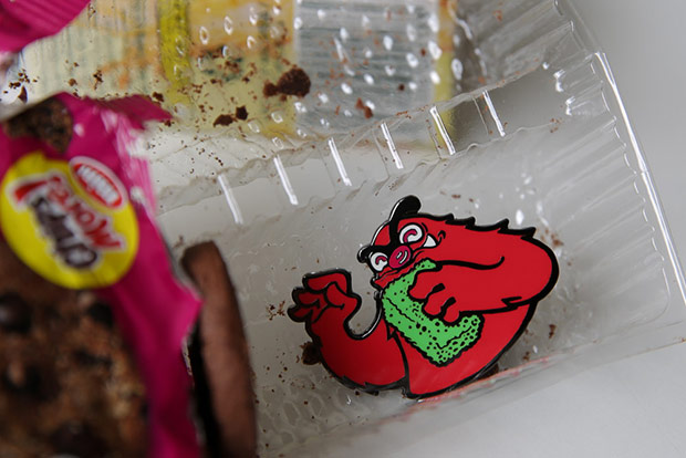 Beware of the Pusha Monee Monster pin who will chomp down your snack.