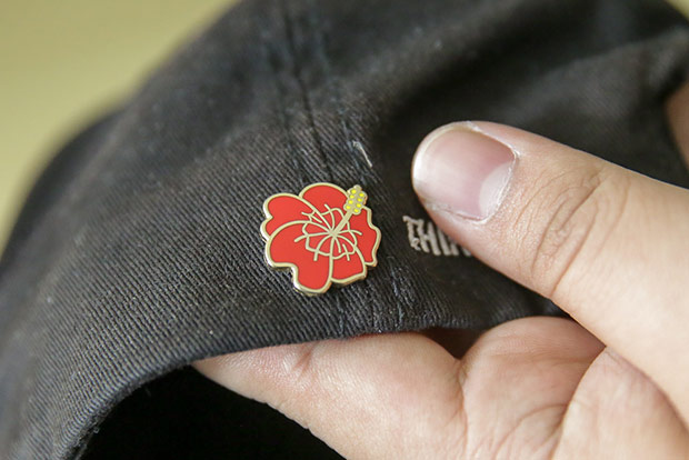 Be proud to be a Malaysian and wear the Hibiscus pin.