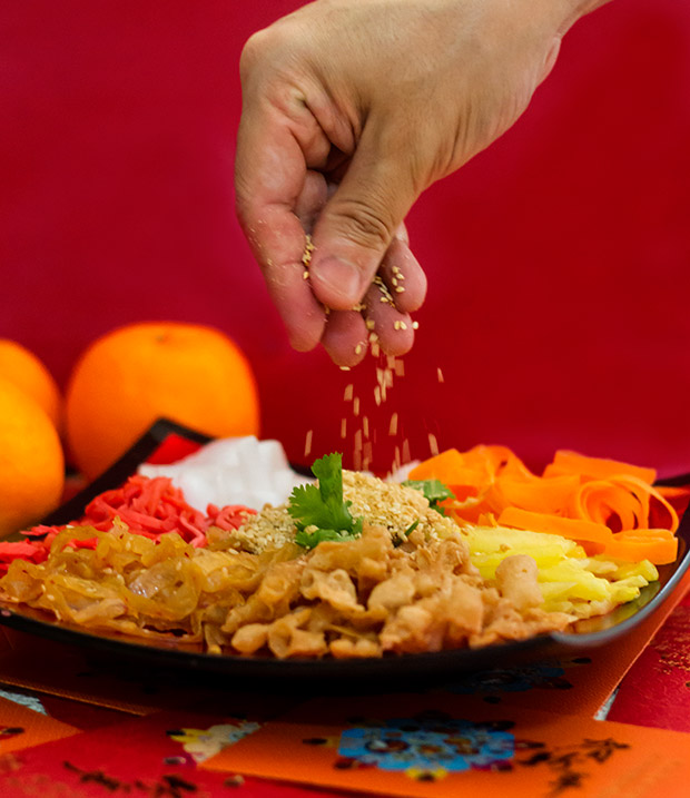 It’s customary to say “Shengyi xinglong” (“Business is booming”) while scattering toasted sesame seeds.