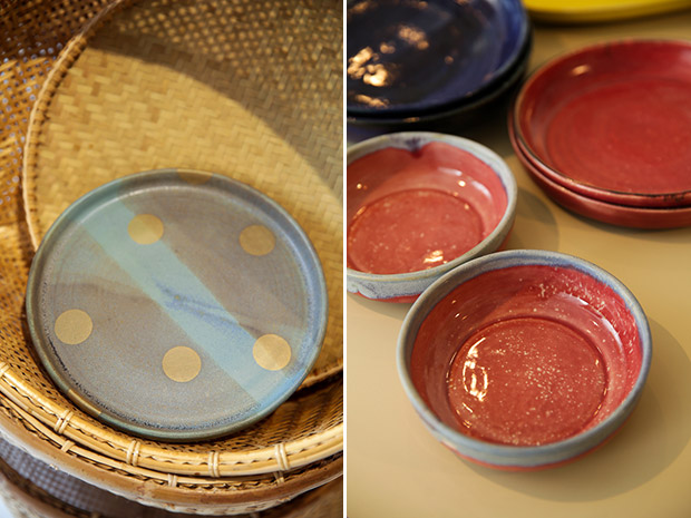 One of her newest designs uses gold decals, and every piece is fired four rounds (left). Contrasting colours give these bowls a unique appeal (right).