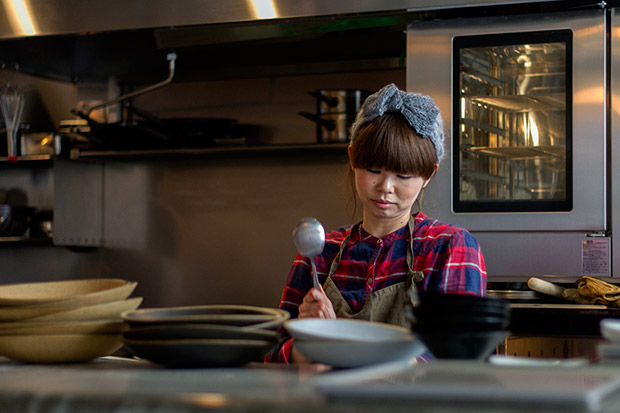 Behind the scenes: Cracking the seeds from a pomegranate.