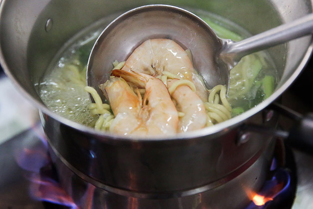 Fresh prawns are added to the broth for the noodles to give it a sweetness.