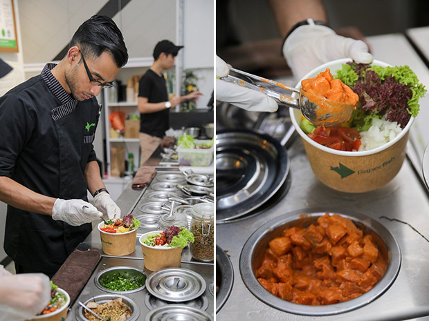You can watch how your poke bowls are assembled at Paperfish (left). The marinated fish is added as a topping for the poke bowl (right).