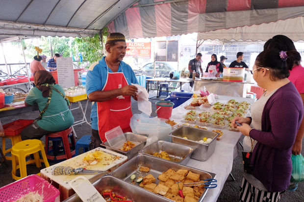Abdul Rashid Adam Shah has been selling his traditional pasembur at the Kampung Melayu Ramadan Bazaar for over 17 years.