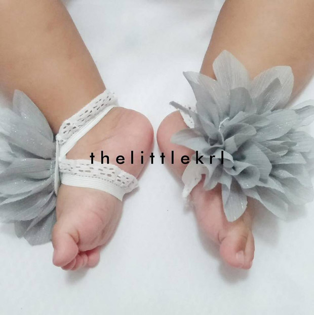 Dress up your babies with a pair of floral barefoot sandals.