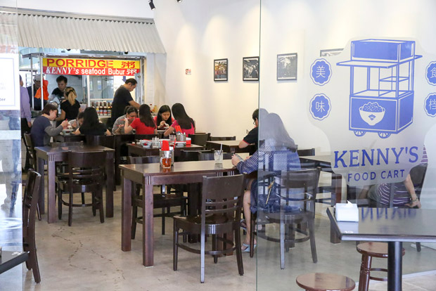 The place is decorated with black and white photographs from their last day of business at the Alisan food street.