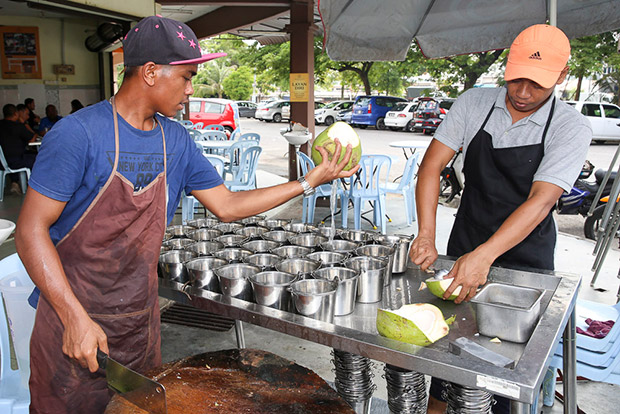 Refreshing fresh coconut water is available by the bucket.
