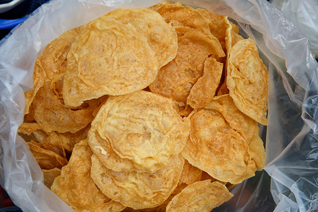 The fritters are made by Lim and painstakingly drained from any excess oil for one week.
