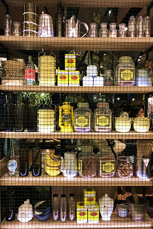 Décor at Kub Kao’ Kub Pla consists of pestles and mortars, tiffin carriers and enamel mugs.