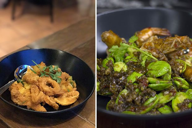 The Thai version of salted egg squid (left). Pad namprik sa-taw goong sod (spicy stink bean prawns) (right).