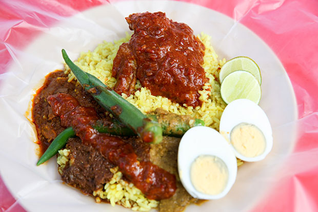 The nasi ganja served with ayam masak merah is a delicious combination of Kedah-styled nasi lemak, nasi Arab and the mix of curries like a nasi kandar stall.