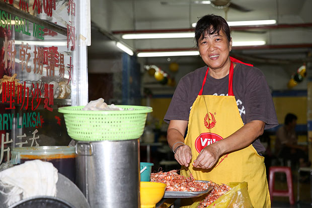 Cheah Pheik Kee will be busy in the morning peeling each poached prawn.