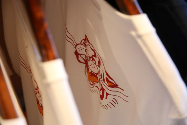 Besides the pin, their tiger mascot also features in T-shirts and jackets.