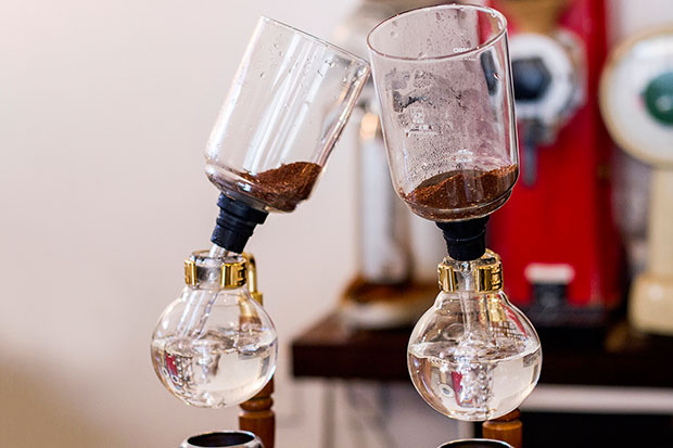 A pair of siphon brewers, ready for action