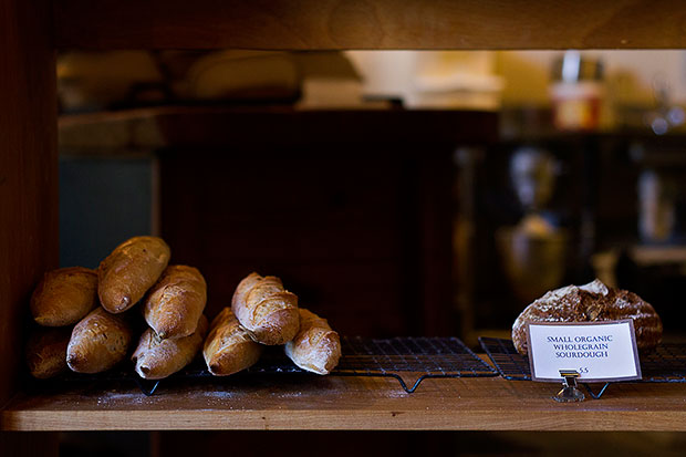 Breads by the bakery next door are supplied through a “rabbit hole” in Red Rabbit Coffee Co.’s wall