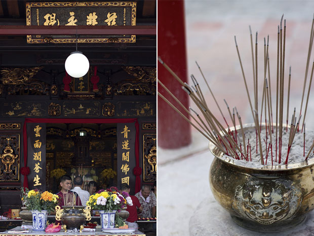 Cheng Hoon Teng Temple displays beautiful South Chinese architecture (left). A pot of incense ash and joss sticks (right)