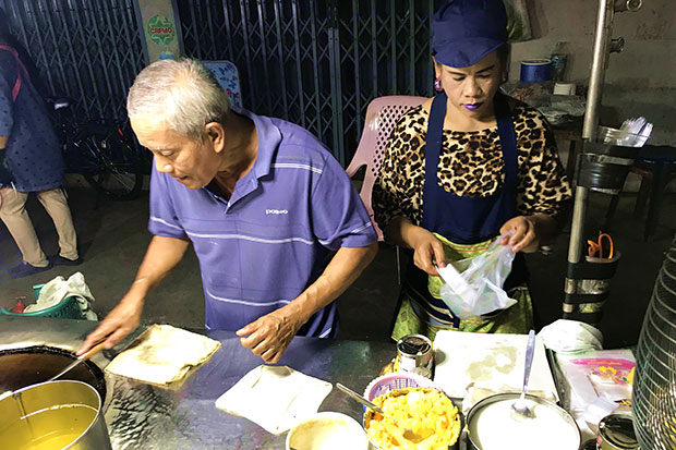 A middle-aged husband-and-wife team runs the popular roti stall.