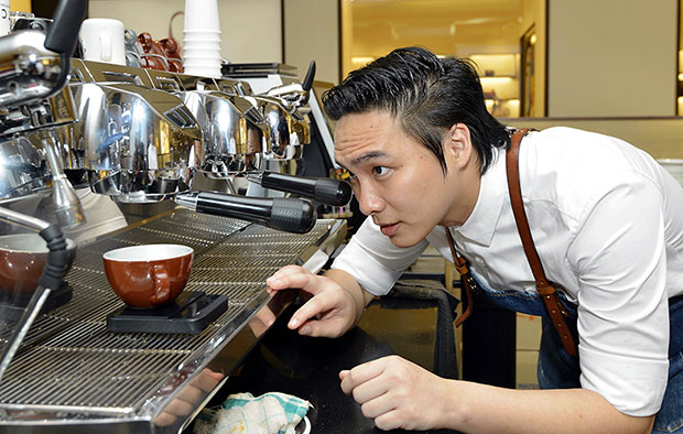 Alan calibrating the espresso machine