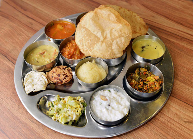 For lunch and dinner, you have the option to order these meals with a little bit of everything, from payasam, poori, rice and bisi bele bhath.