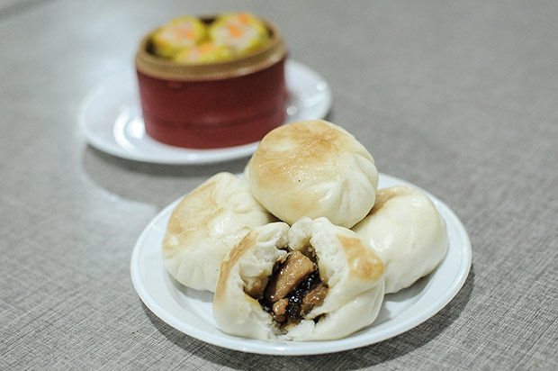 Break open these soft, fluffy buns to discover the unusual, tasty rice wine chicken filling.
