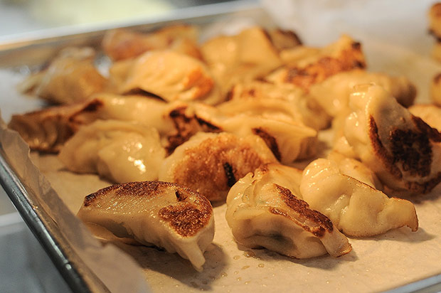 Shanghai dumplings or wor tip are handmade and pan fried.