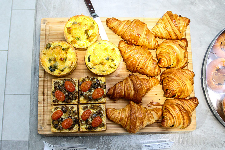 Enjoy their fully laden quiches (a choice of mushroom or roasted vegetables) and flaky butter croissants.