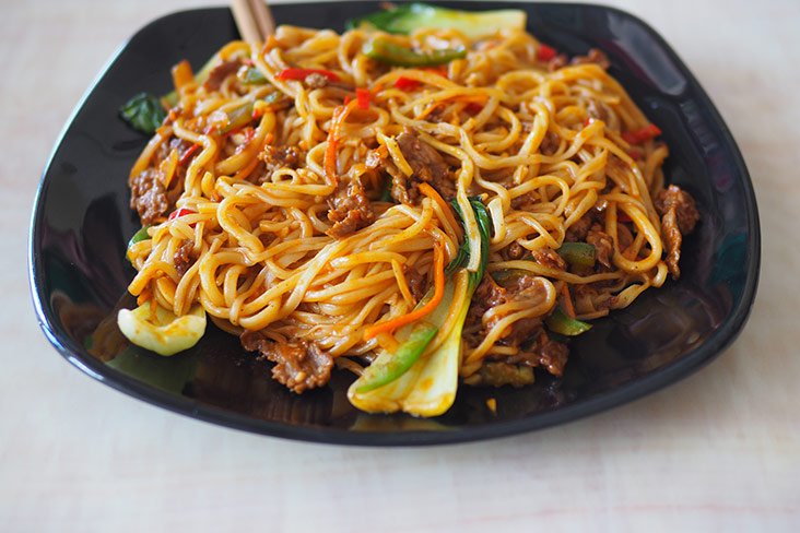 Slurp up these stir fried handmade noodles with a choice of beef or chicken.