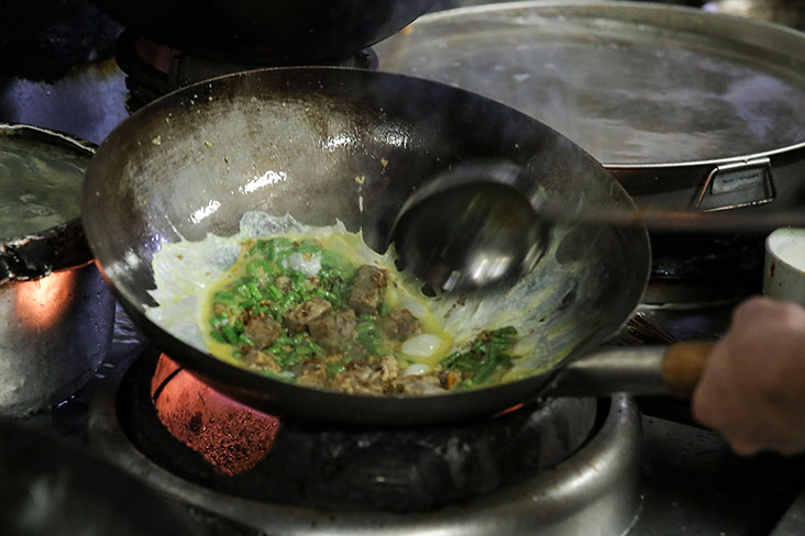 The stir fried yam is cooked up using a hot wok with egg, long beans and dried shrimps, as inspired by chai tow kuih