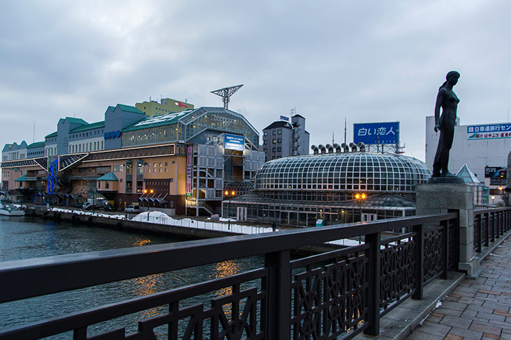 The iconic Nusumai Bridge, with the MOO and EGG buildings in the background.