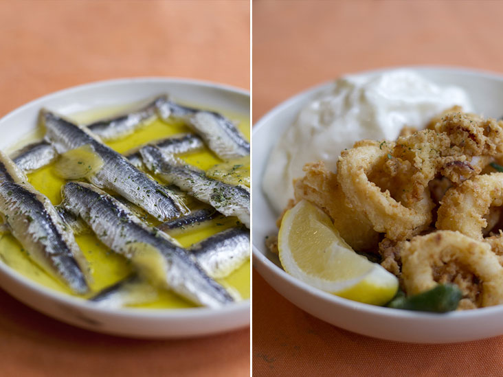 Briny boquerones en vinagre (anchovy fillets marinated in vinegar and olive oil) (left). Deep-fried calamari served with allioli, an emulsion made of garlic and olive oil (right)