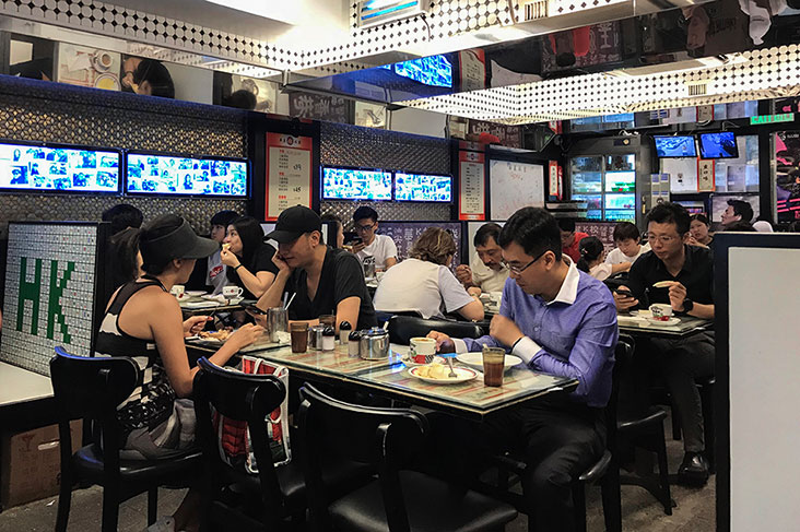 Breakfast crowd inside the always busy cha chaan teng