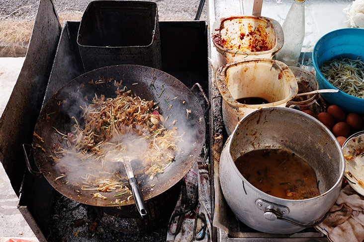 The Siam Road char koay teow stall in front of their own coffee shop along the same road.