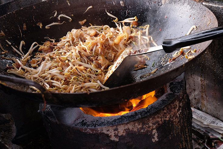 The Siam Road char koay teow uses charcoal fire which lends a smoky layer to the fried noodles.