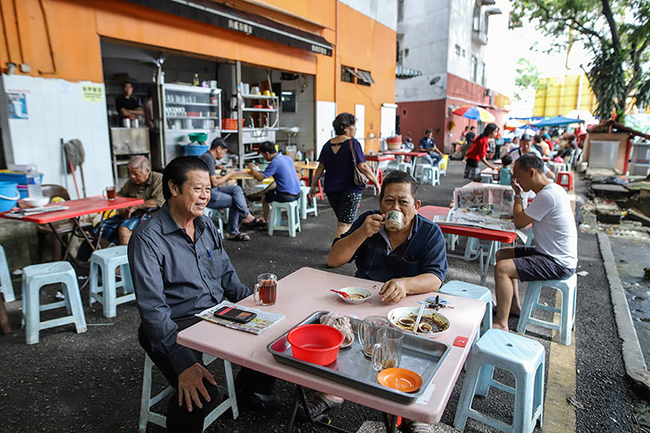 The coffeeshop offers tables and chairs under the shade.