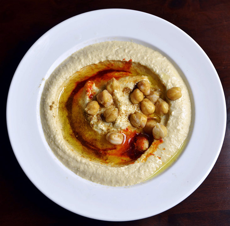 You can order appetisers like hummus made with creamy chickpeas and tahini on its own or pair it with your shawarma.
