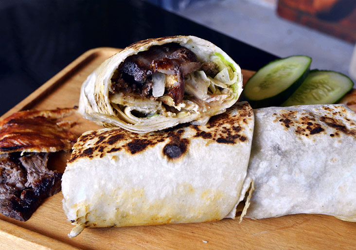 What makes a good shawarma is freshly prepared and cut meats from the skewer.