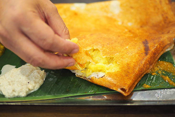 Order the ghee masala dosa packed with potatoes for a more filling meal