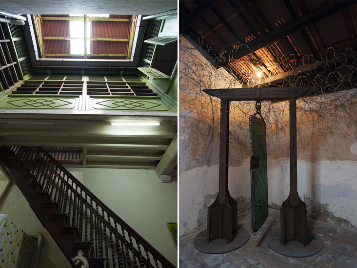 One of several airwells that bring natural light into Art Lane. Notice the cat on the side of the stairs? (left). Ono Kang’s Chae Chuan Kui, Chae Yit Cheh (Above All Else, We Must Learn To Control Our Breath) features a prison door crowned by barbed wire to represent the delicate divide between human rights and status (right)