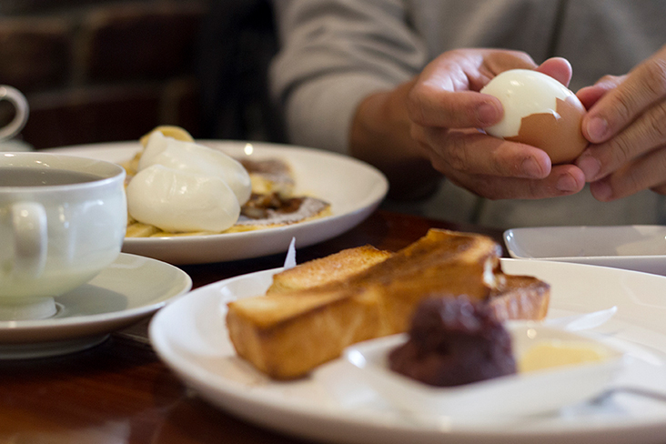 Enjoy Café Tirol’s moningusetto (breakfast set) that includes toast, a hard-boiled egg and black coffee