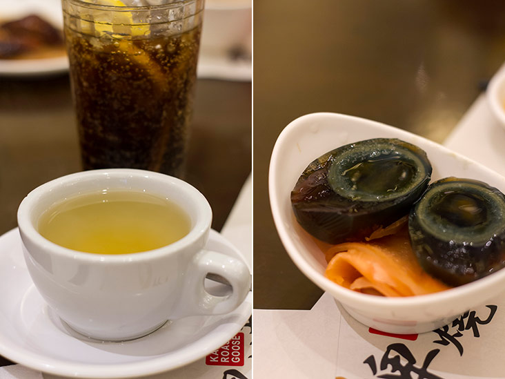 Typical beverages at a Hong Kong restaurant: chrysanthemum tea and lemon Coke (left). Luscious century eggs (right).